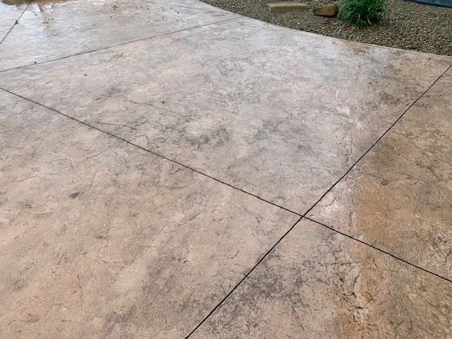 A close up of a concrete patio with a concrete floor