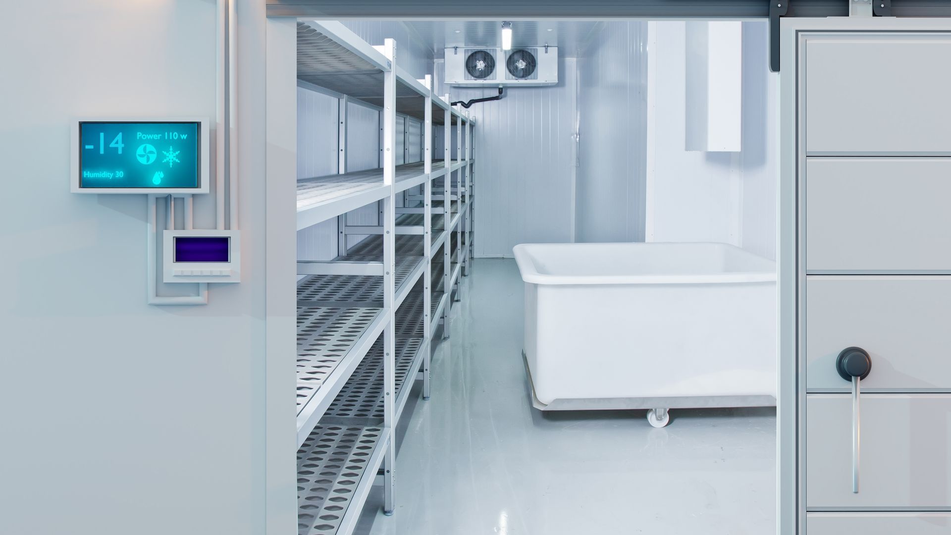 Cold storage room with metal shelving, temperature gauge at -14 degrees, and a large white tub.