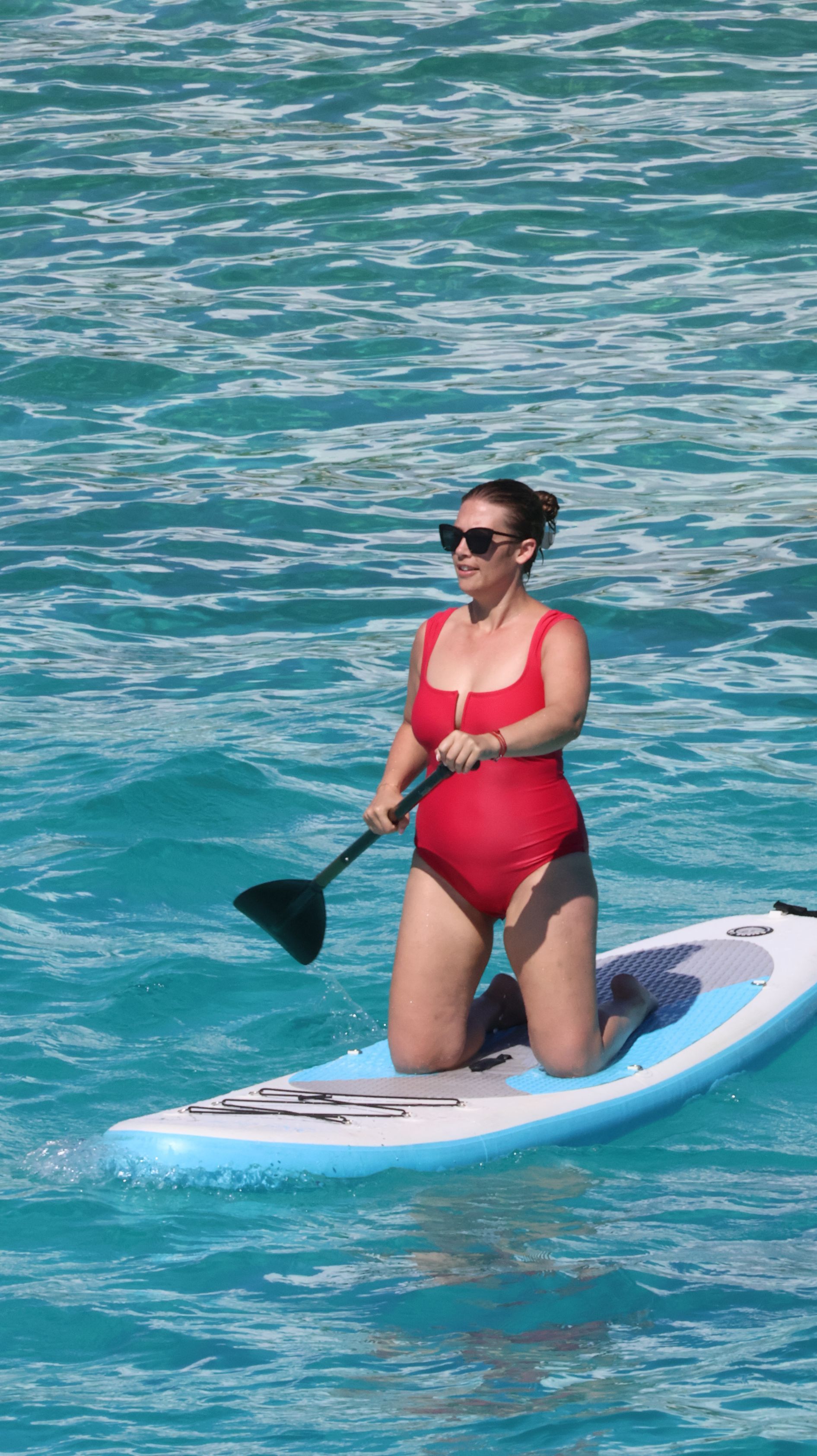 Paddleboarding at Mullet Bay on Sail the Phoenix