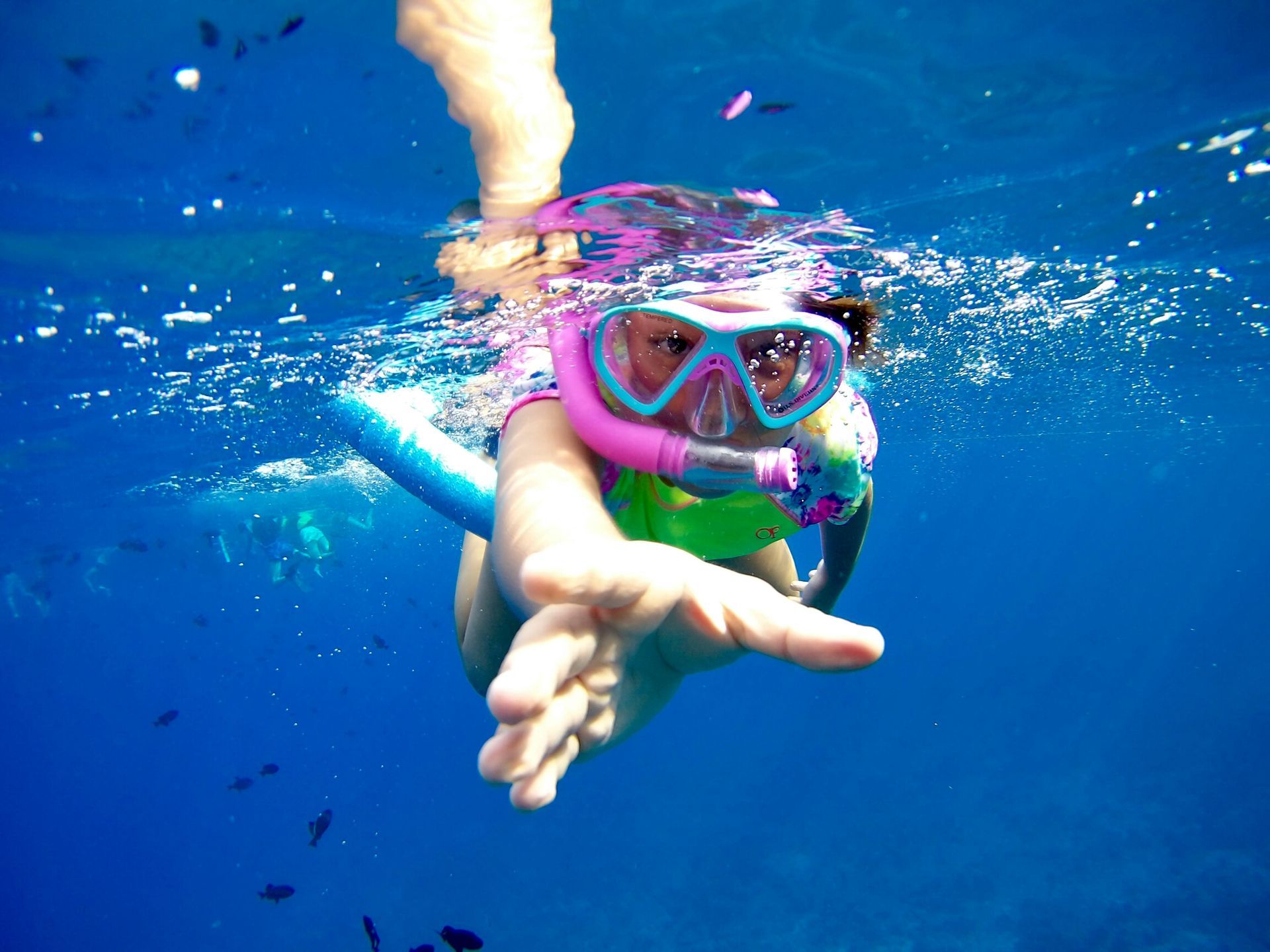 Child snorkeling at Little Bay