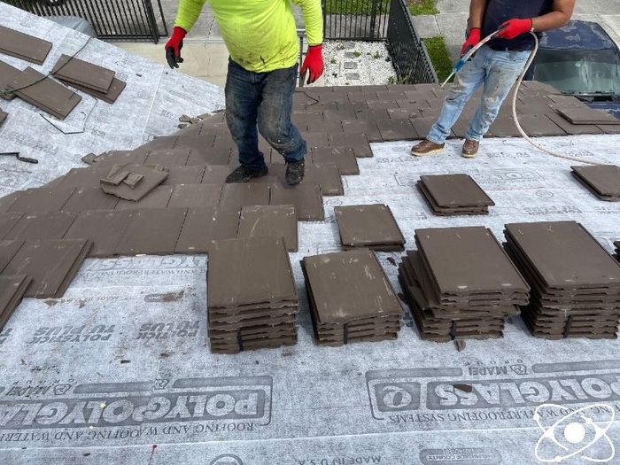 Atom Roof Repair performing a tile installation in Miami Dade county