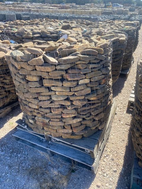 A pile of rocks is sitting on top of a wooden pallet.