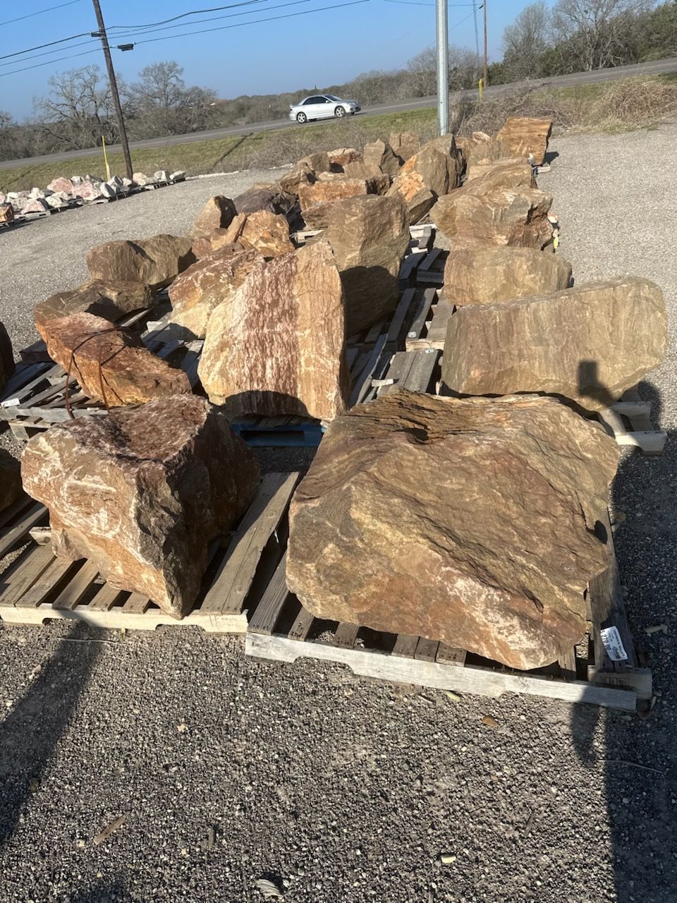 A pile of rocks sitting on top of a wooden pallet.