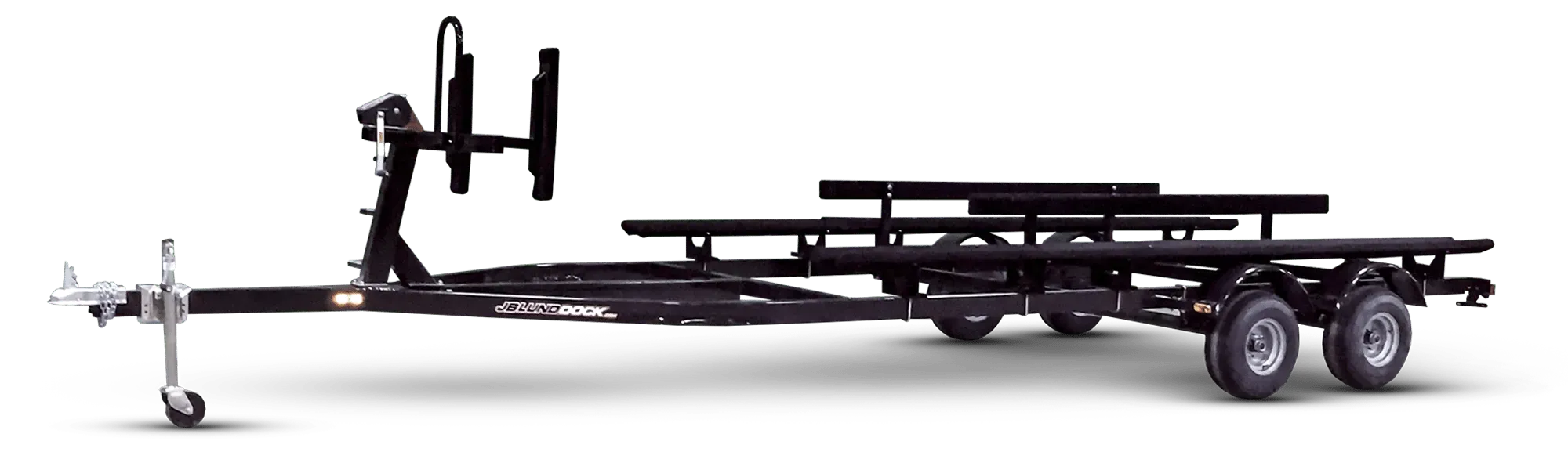 A black trailer with a picnic table attached to it