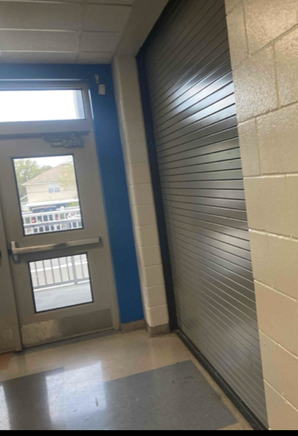 A Hallway with a Rollup Door - Bradenton, FL - C&D Industrial Maintenance