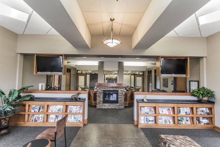 There is a fireplace in the middle of the room.