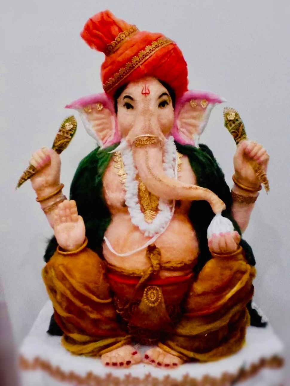 Intricate and creative cotton sculpture of Ganesha with different colors