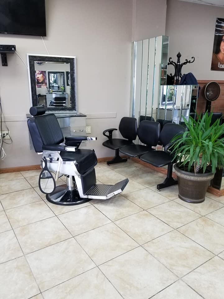 indoor salon photo showing  stylist chair