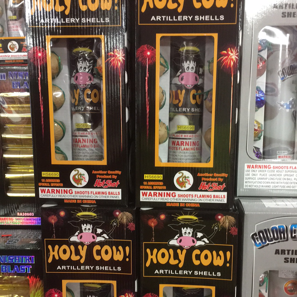 Several boxes of holy cow artillery shells are on display