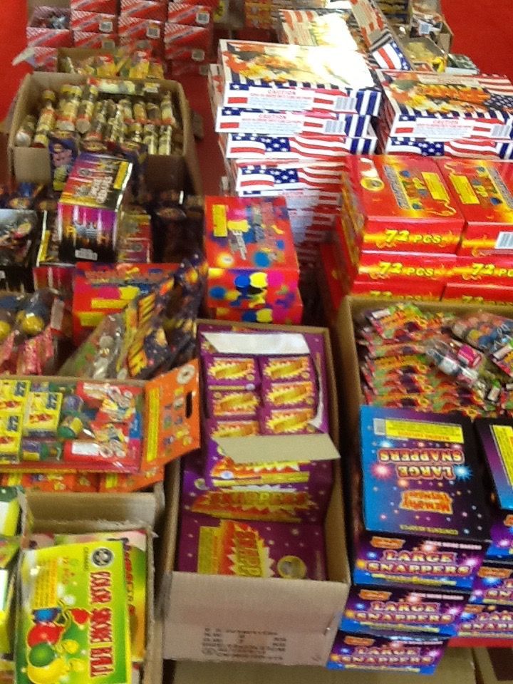Boxes of fireworks are stacked on top of each other