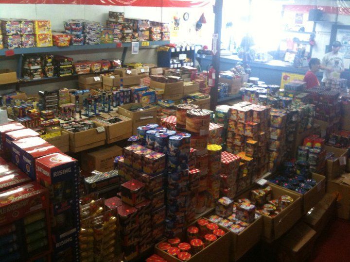A store filled with lots of boxes of fireworks