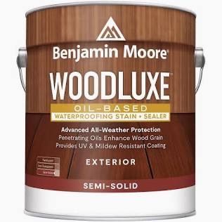 A gallon can of Benjamin Moore Woodluxe oil-based exterior semi-solid waterproofing stain and sealer.