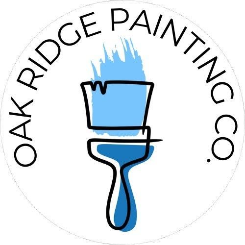 The logo for oak ridge painting co. shows a brush with blue paint on it.