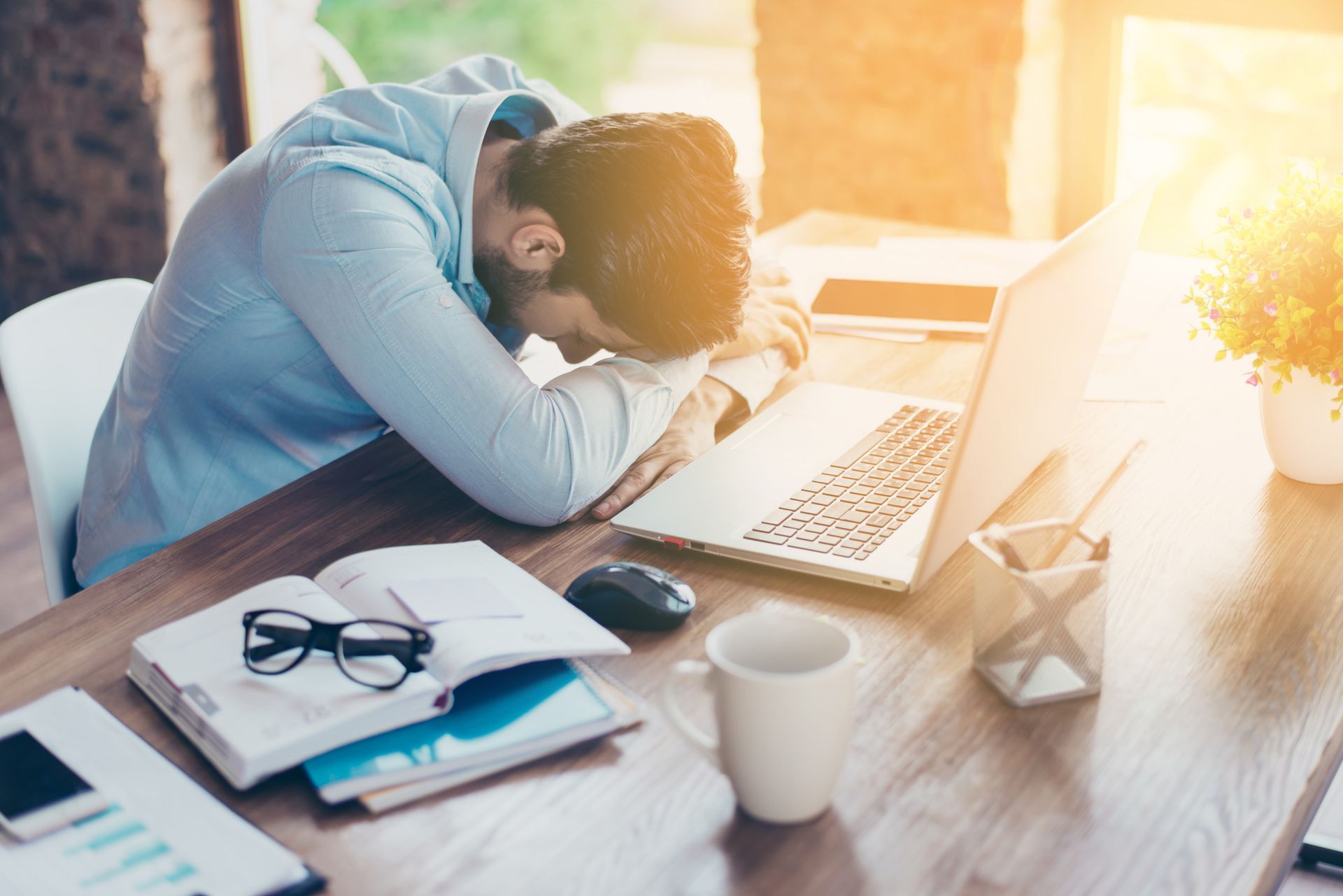 frustrated man at a desk