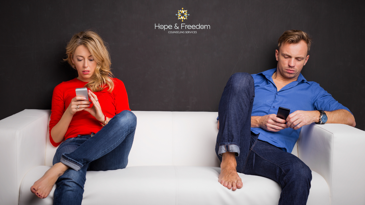 couple not talking to one another because sex addiction and betrayal trauma recovery as stalled out