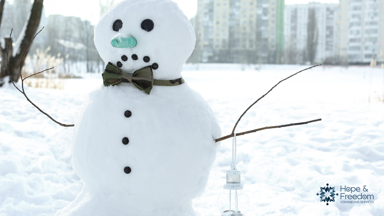 Sad snowman figuring out how to survive the holidays after infidelity