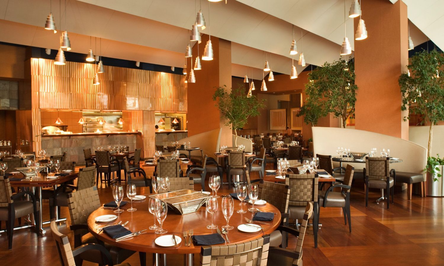 Rollers Media: Two computer monitors on a desk in a dark room with blue lighting, displaying web pages.