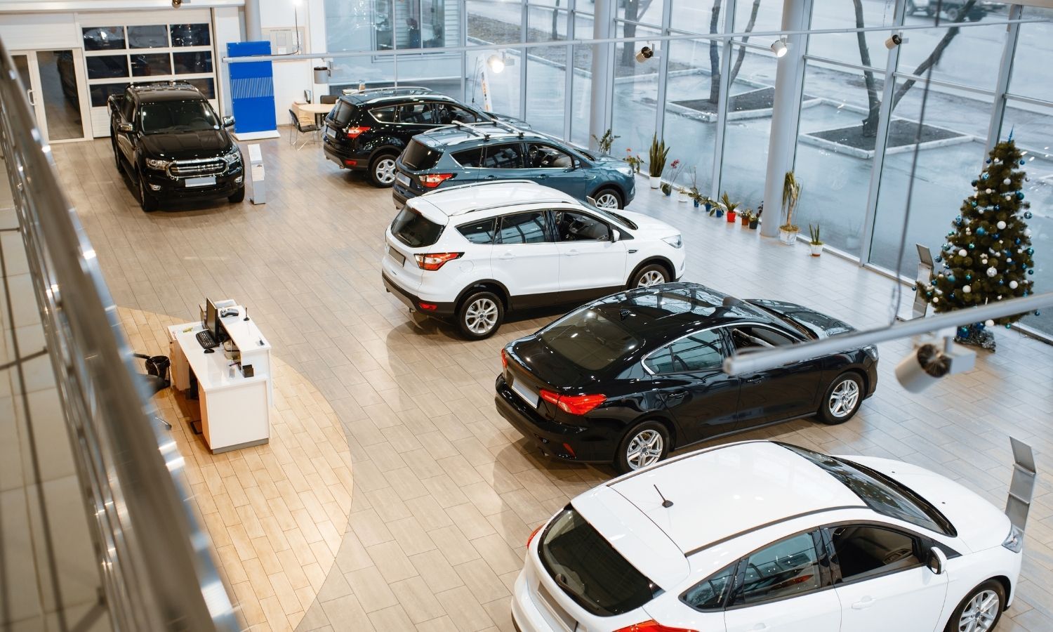 Rollers Media: Two computer monitors on a desk in a dark room with blue lighting, displaying web pages.