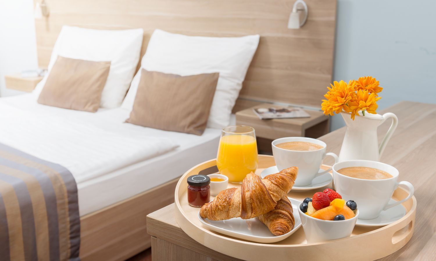 Rollers Media: Two computer monitors on a desk in a dark room with blue lighting, displaying web pages.