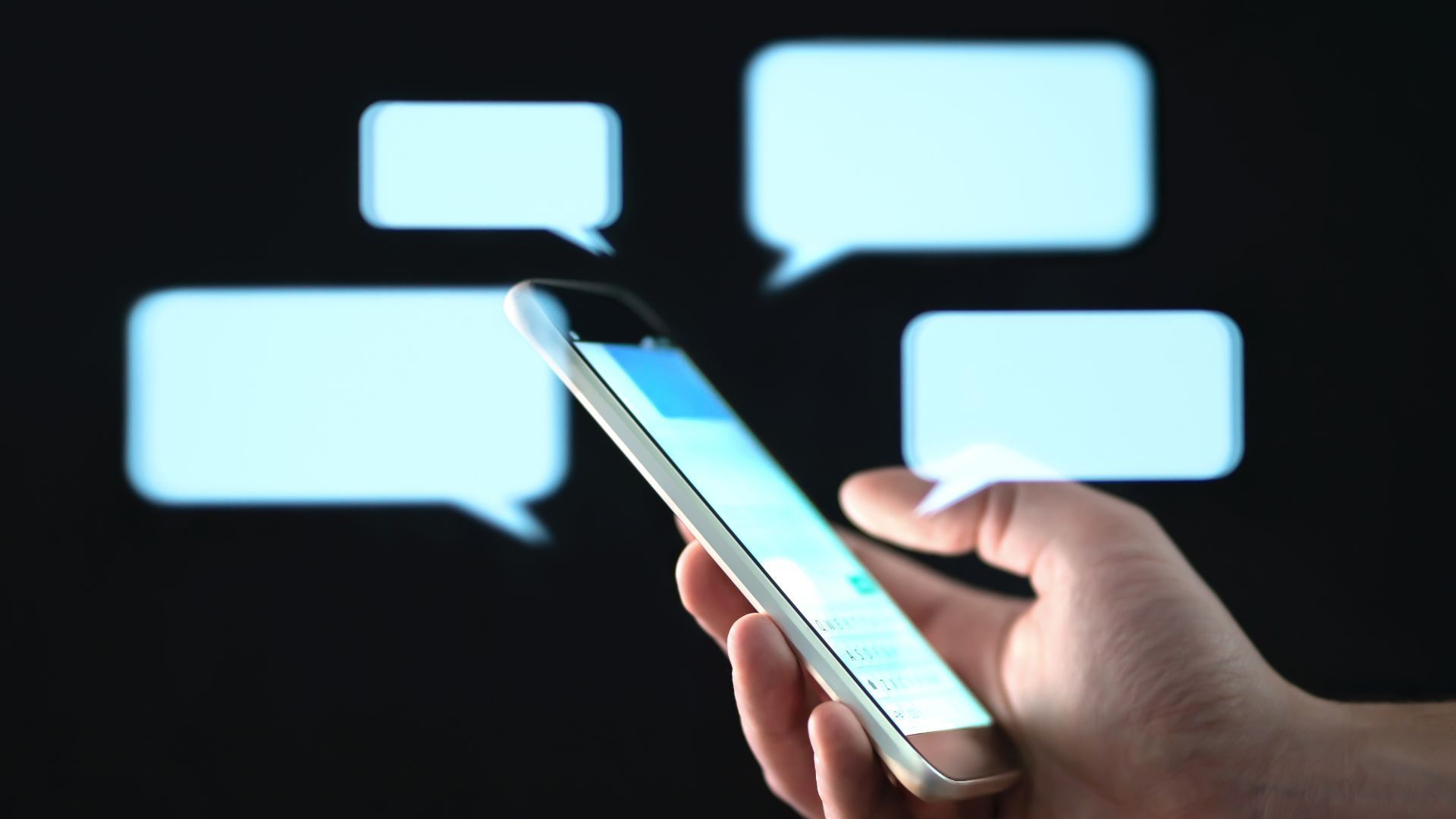 Rollers Media: Laptop keyboard with small flags displaying social media terms like