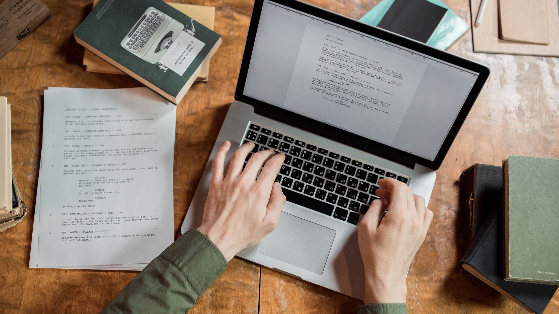 Rollers Media: Person working on a laptop, tablet, and smartphone with business icons overlaid, likely in an office.