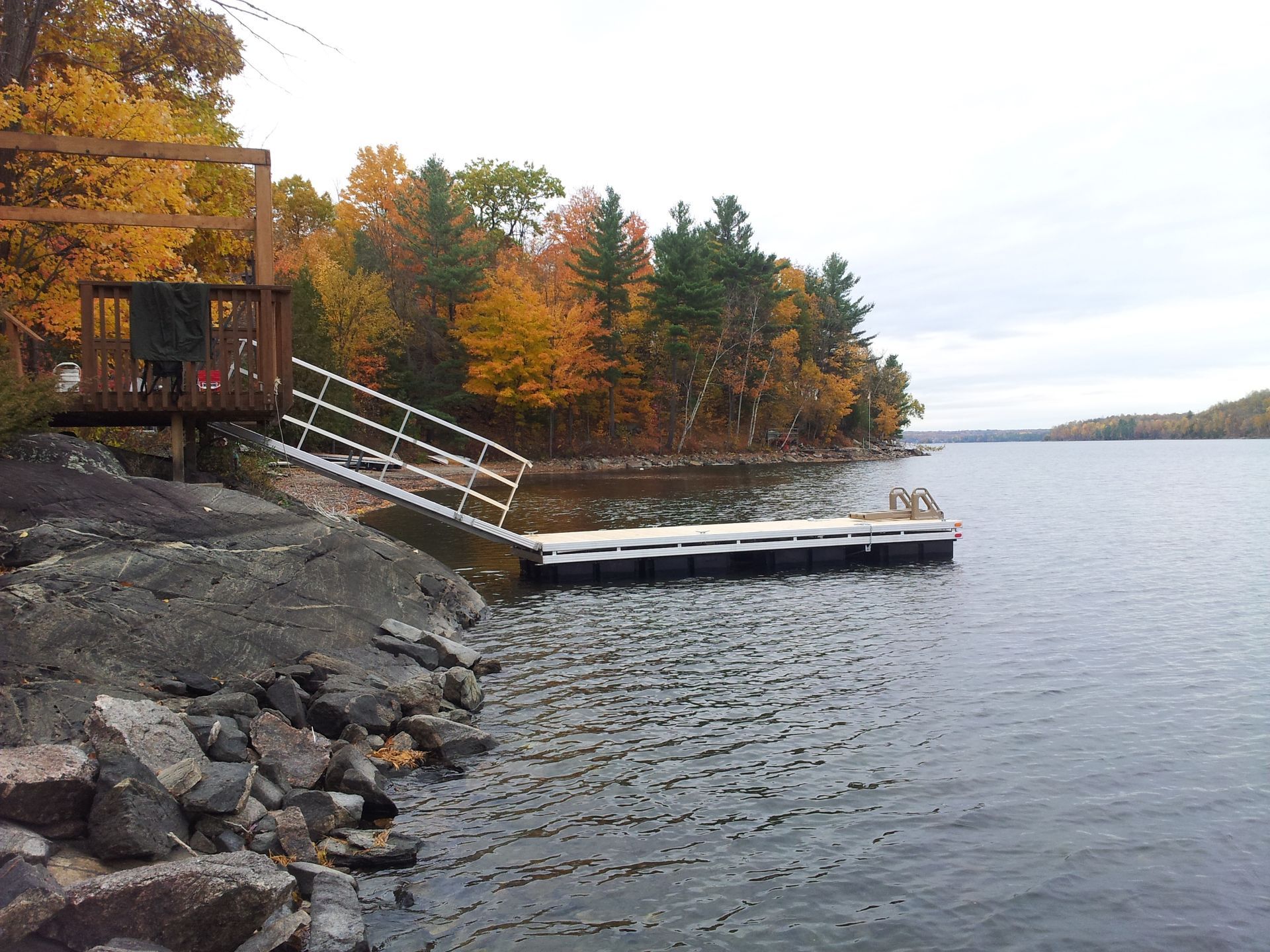 Custom dock on shoreline in the fall