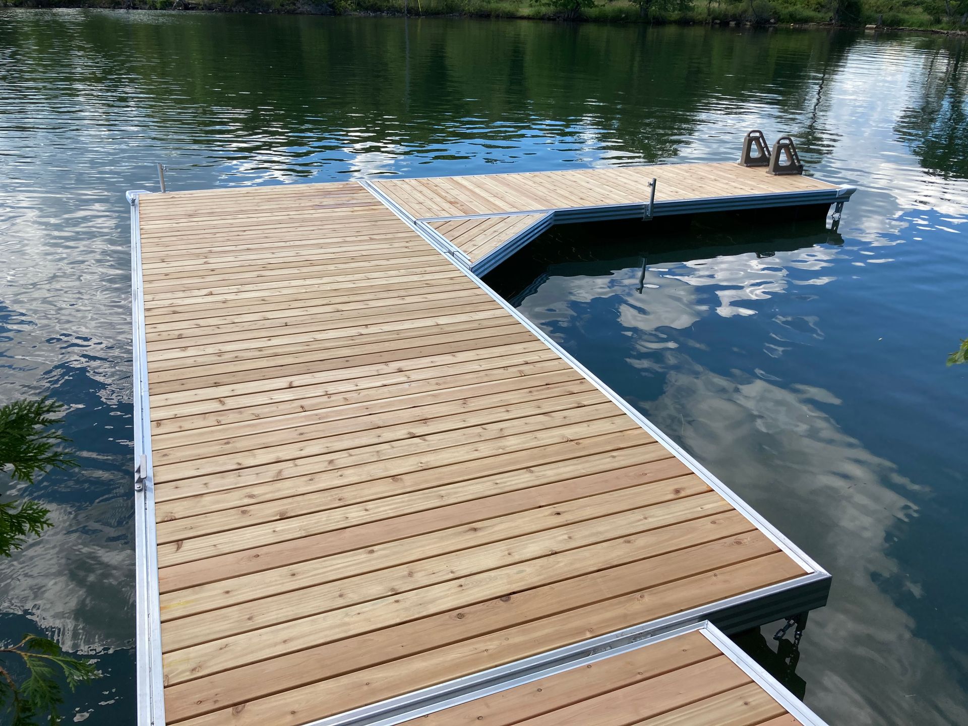 A wooden dock in the middle of a lake