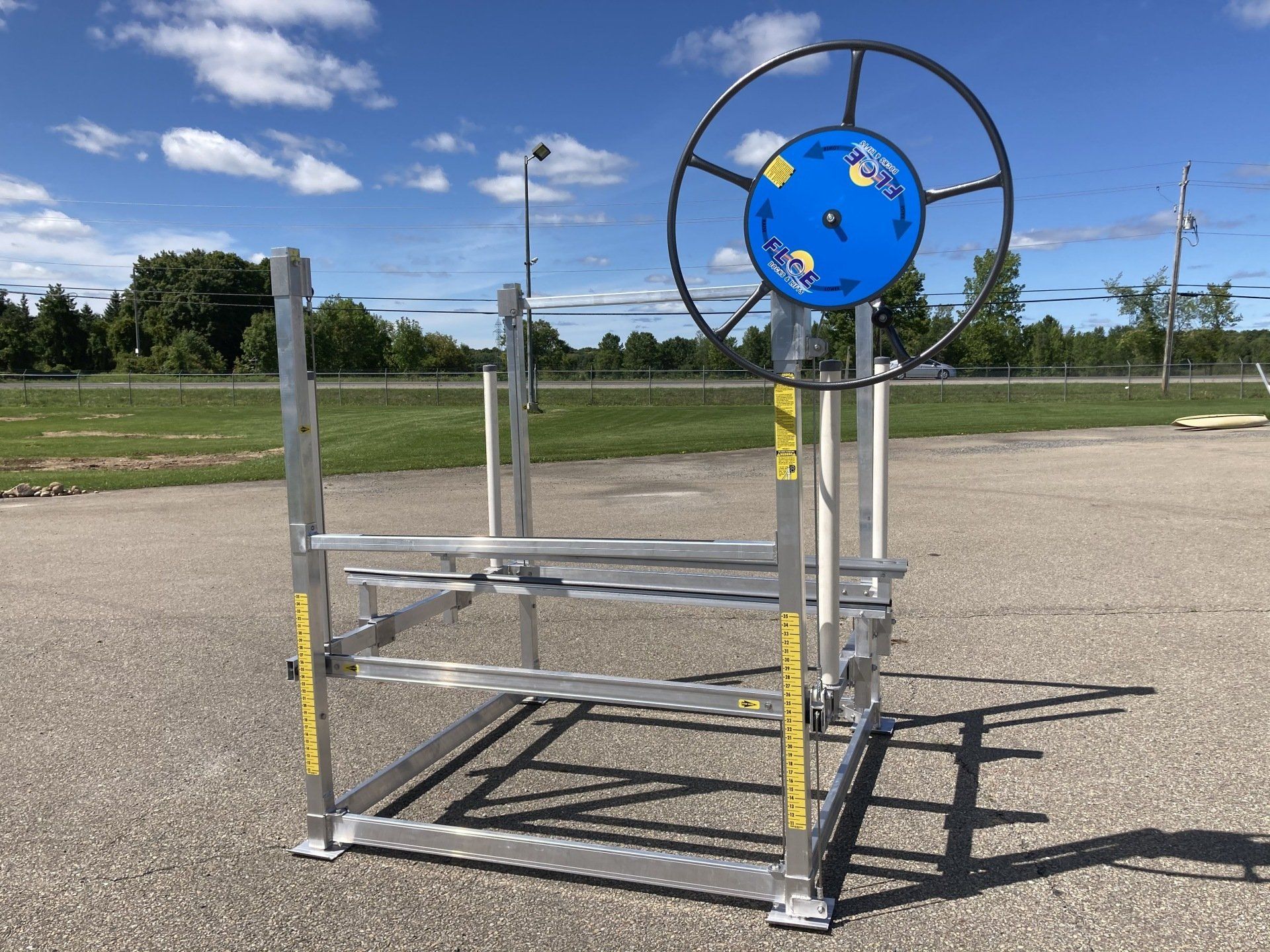 A metal structure with a blue sign on top of it.