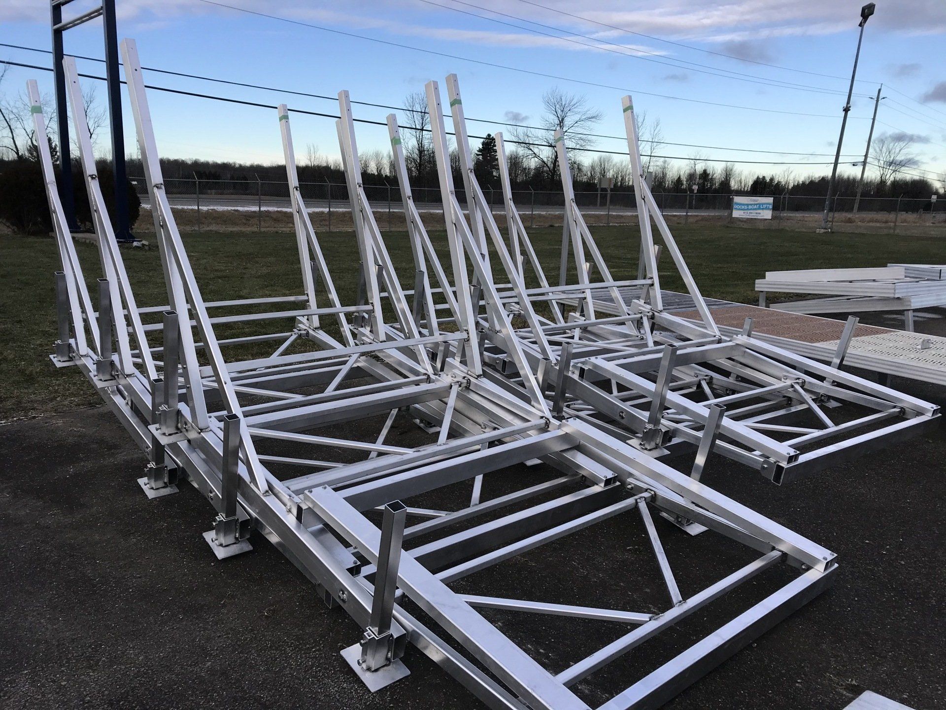 A bunch of metal frames are stacked on top of each other