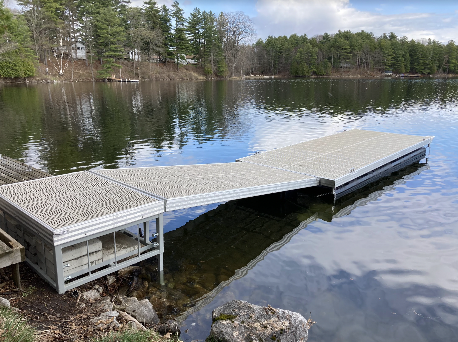 A dock is sitting in the middle of a lake.