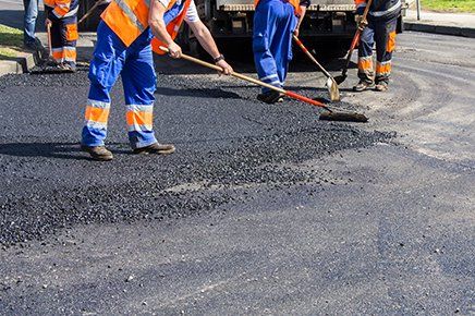 Paving Contractor — Workers Doing Asphalt Services in Suffolk, VA