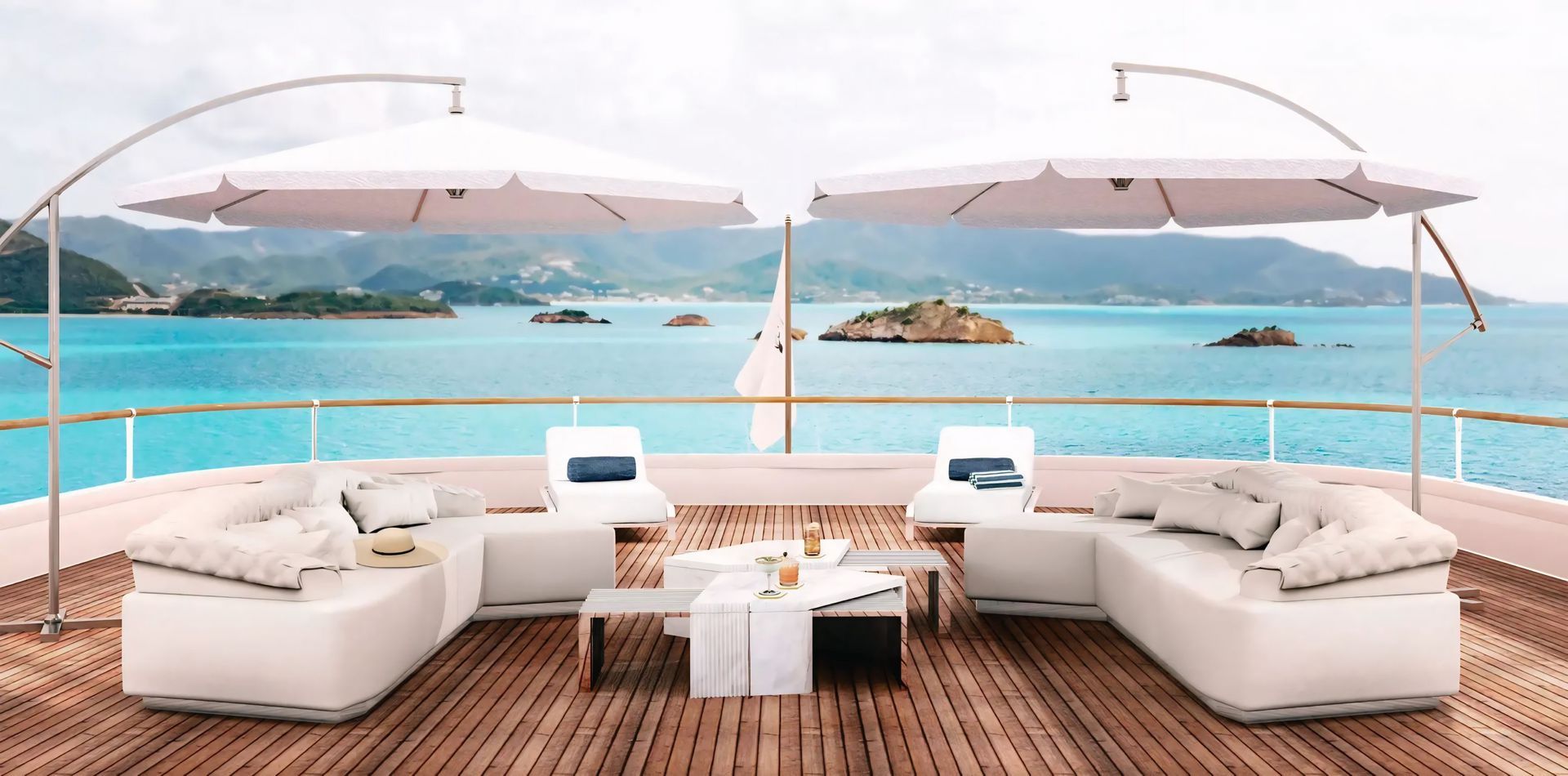 Een terras met een bank en parasols met uitzicht op de oceaan