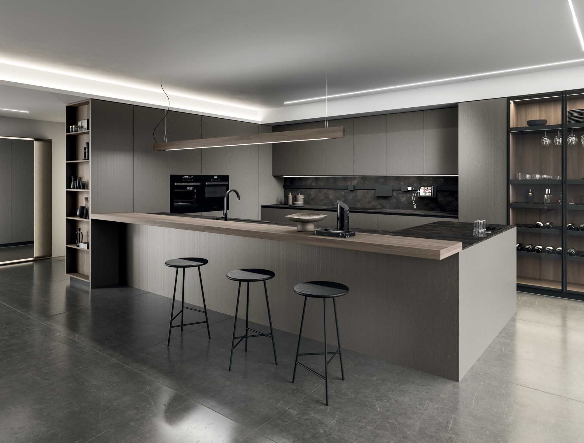 Een keuken met een groot eiland en drie krukken