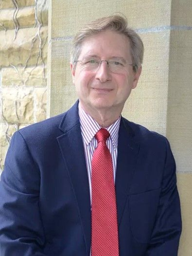 Rev. Bobbie Bella, Pastor