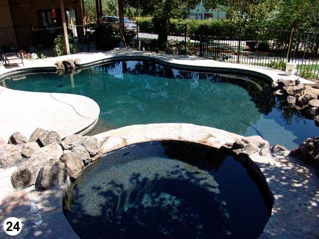 A large swimming pool with the number 24 on the bottom