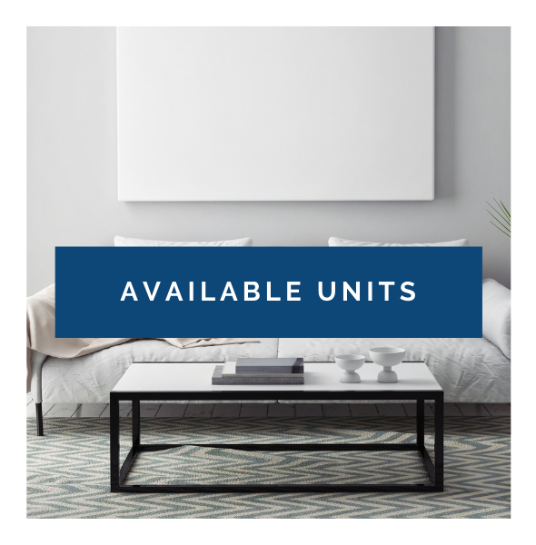 Modern living room with a blue banner reading “AVAILABLE UNITS” over a sofa and coffee table.