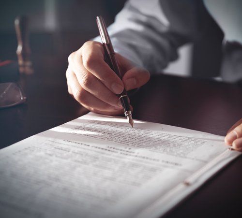 Notary Signing a Contract — De Pere, WI — One Law Group S.C