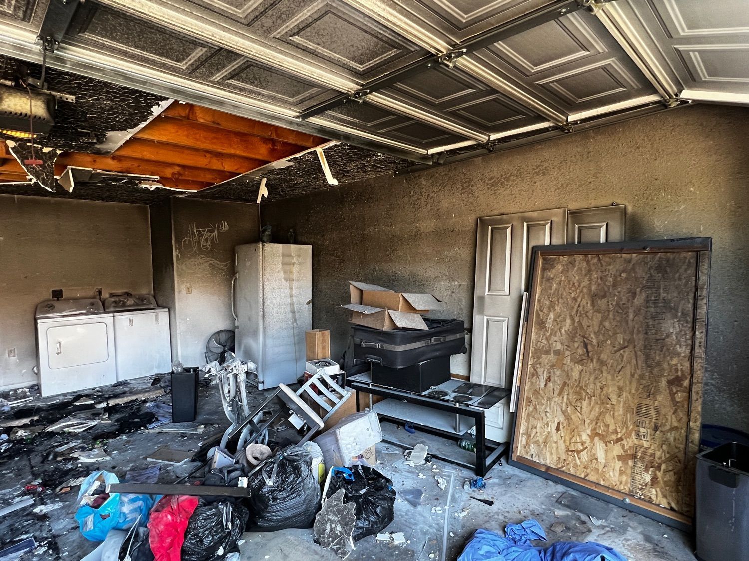 There is a lot of trash in the garage.