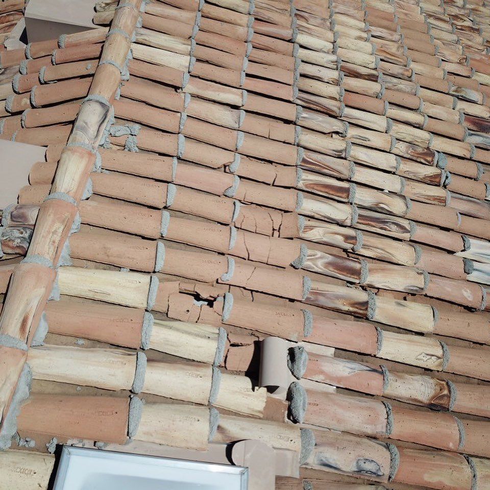 A roof with a lot of bricks on it