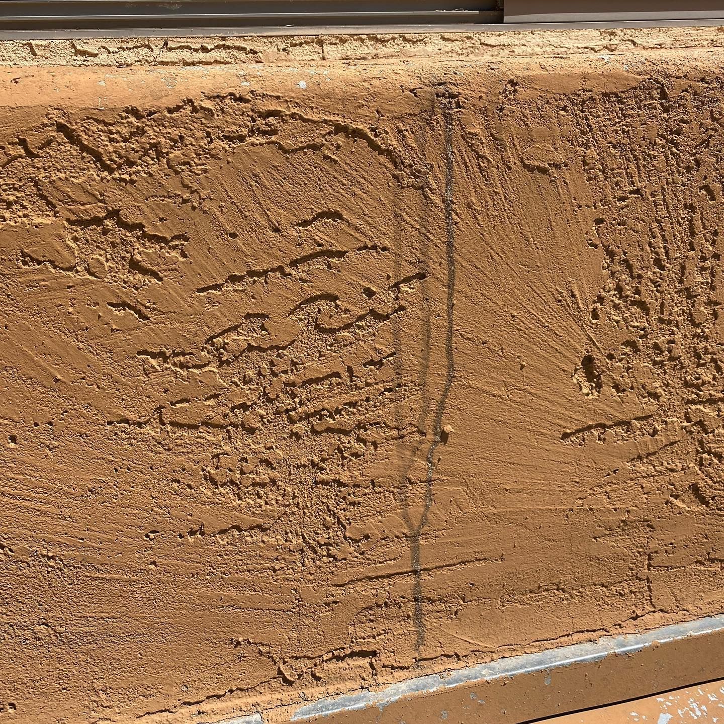 A close up of a piece of wood with a drawing on it.