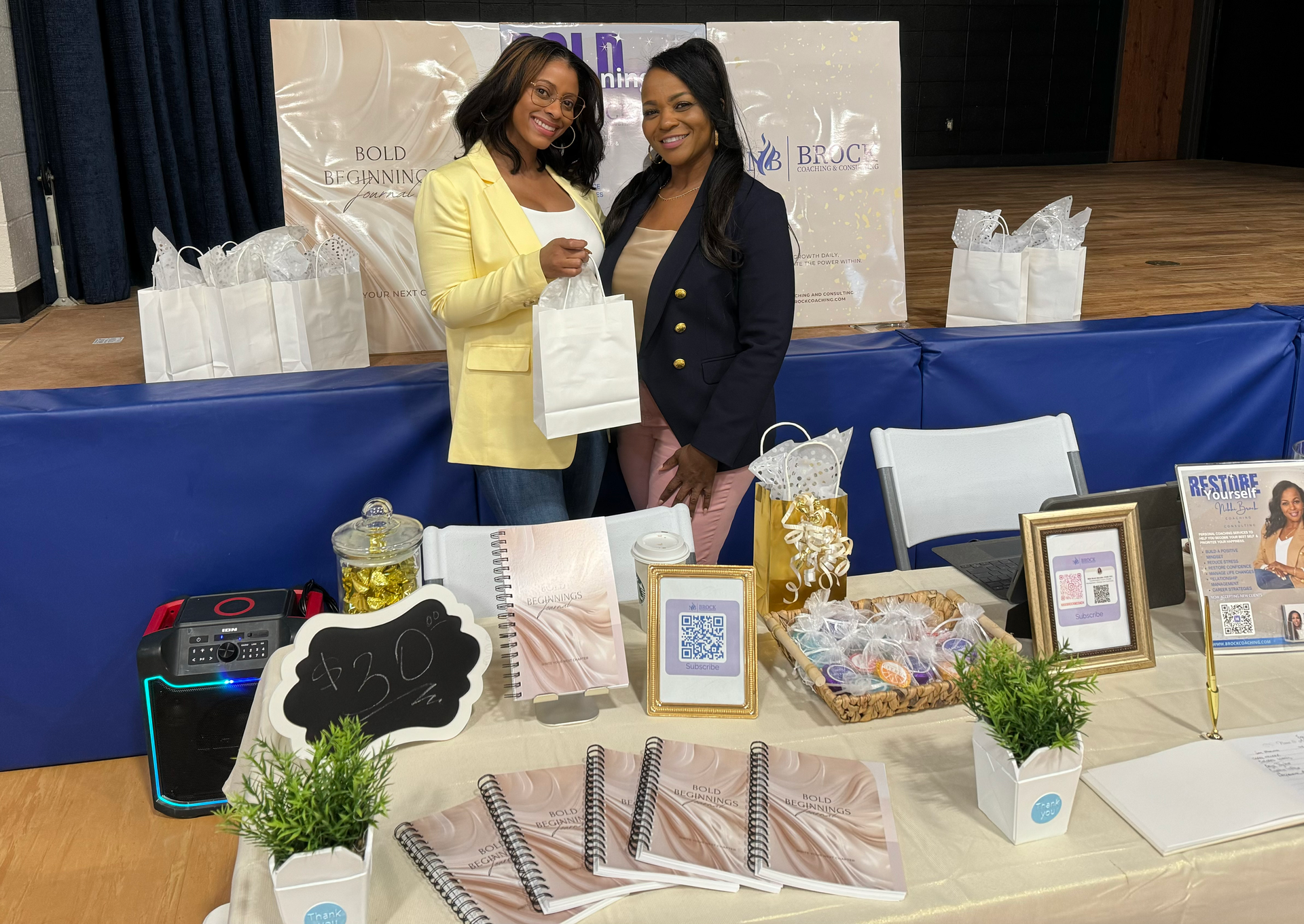 A woman is giving a presentation to a group of people in a lecture hall.