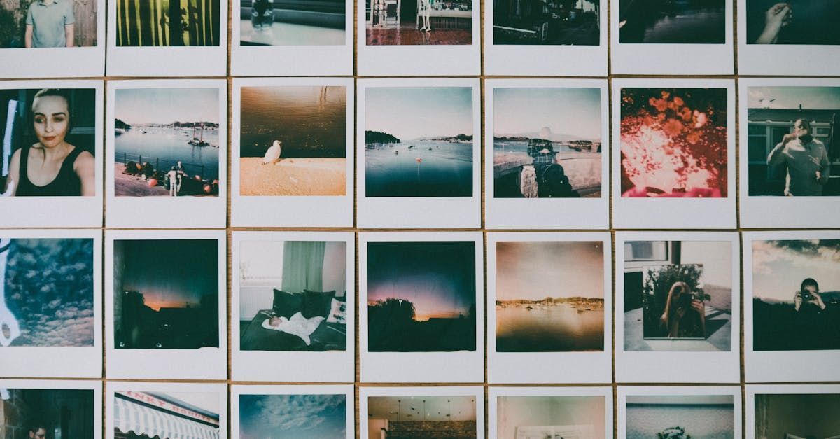 A wall filled with a variety of polaroid pictures.