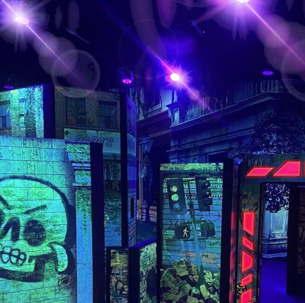 Urban themed glow in the dark laser tag arena