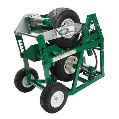 A green cart with wheels and a tire on it