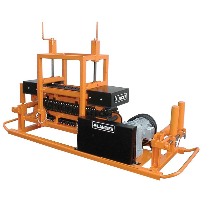 A large orange and black machine is sitting on a white surface.