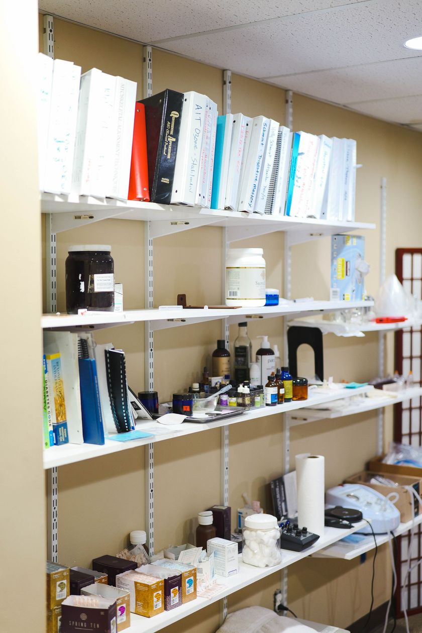 A room with a lot of shelves filled with various items