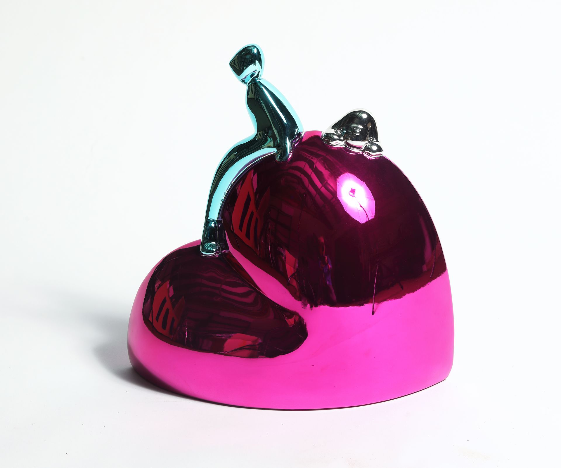 A pink and purple object with a person on top of it