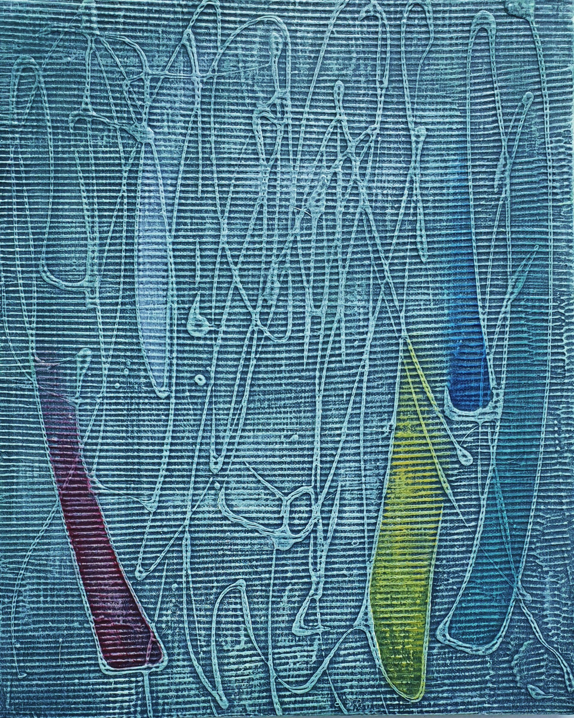 A close up of a painting on a brick wall.