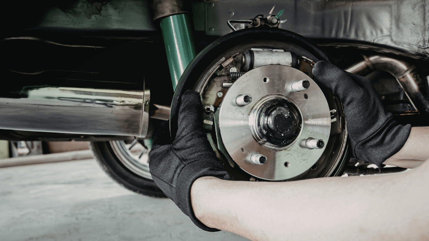 a mechanic doing a brake service