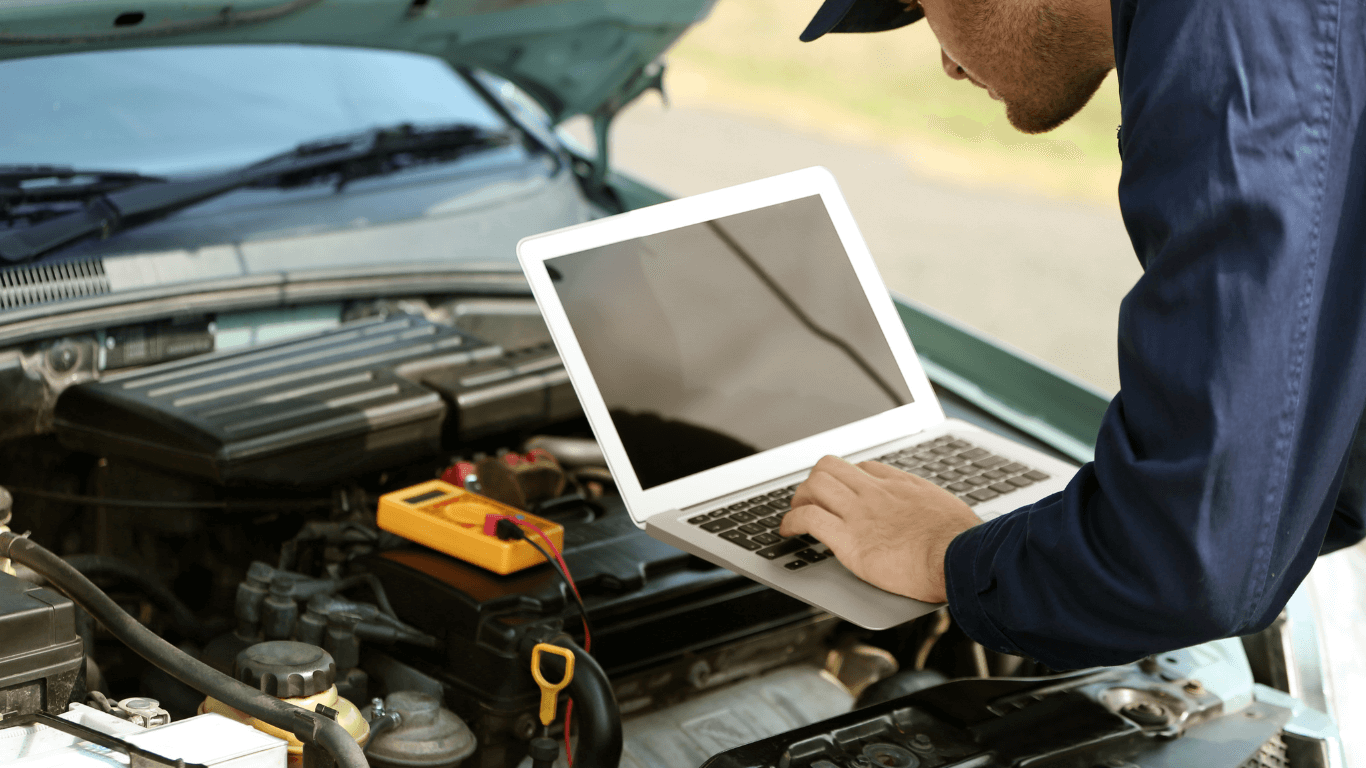 mobile mechanic performing a car diagnostic 